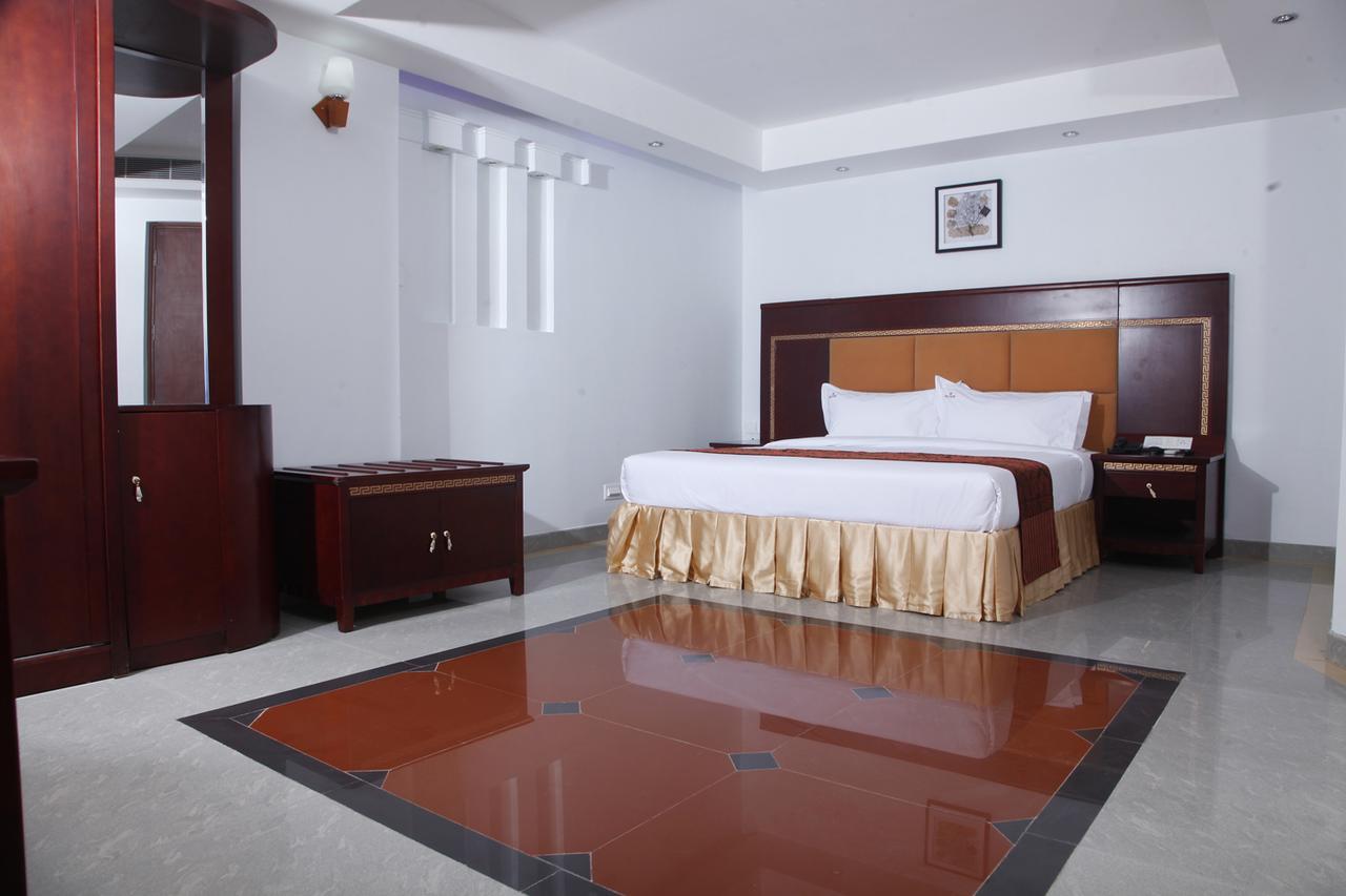 Hotel Hiton Perintalmanna Habitación foto