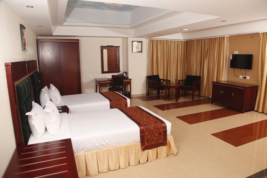 Hotel Hiton Perintalmanna Habitación foto